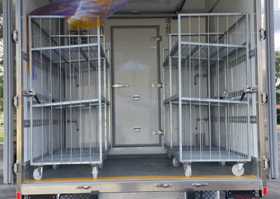 compartmentalised refrigerated truck body with racks