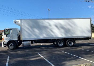 refrigerated truck body with rear door